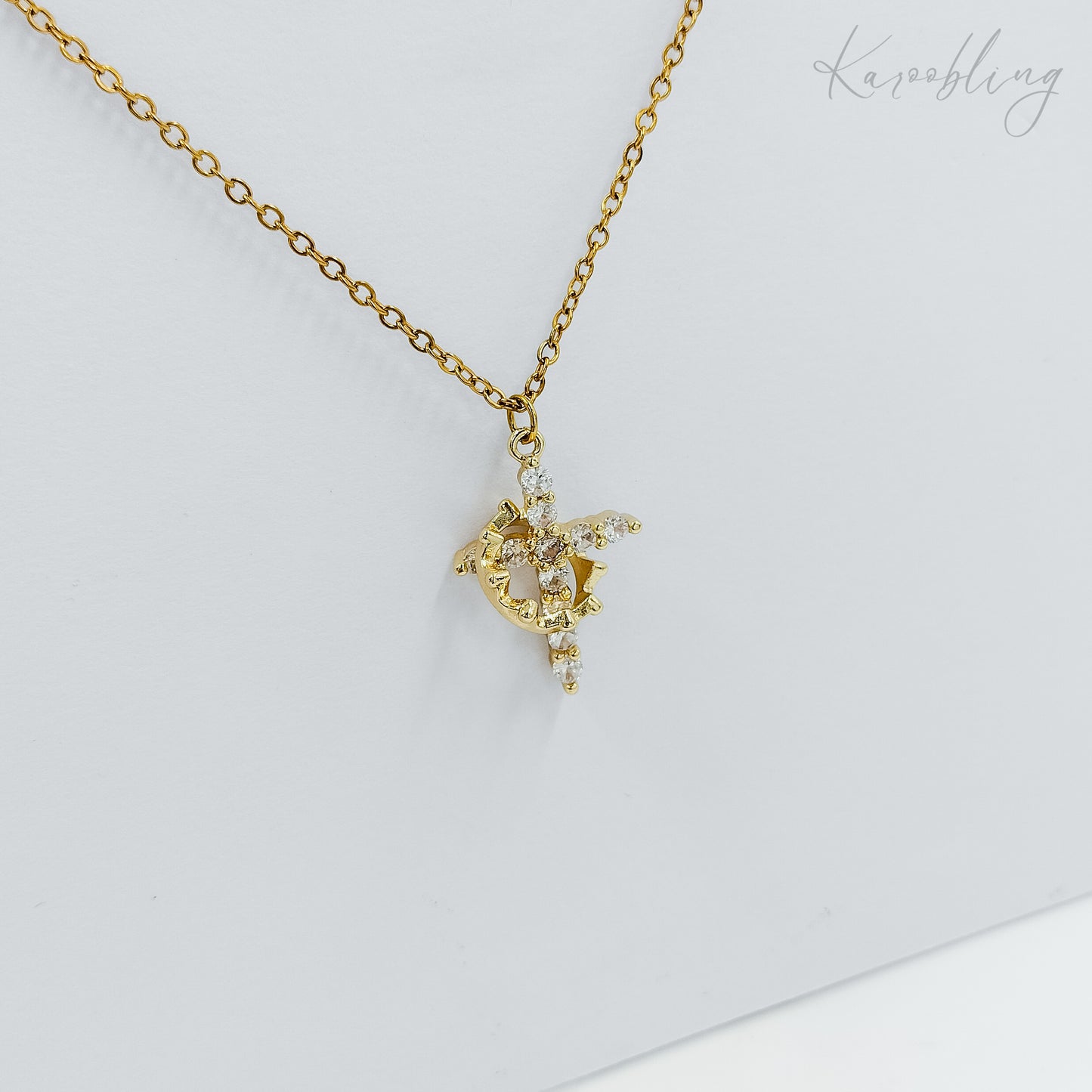 rotating crown cross necklace gold plated (fashion jewellery)