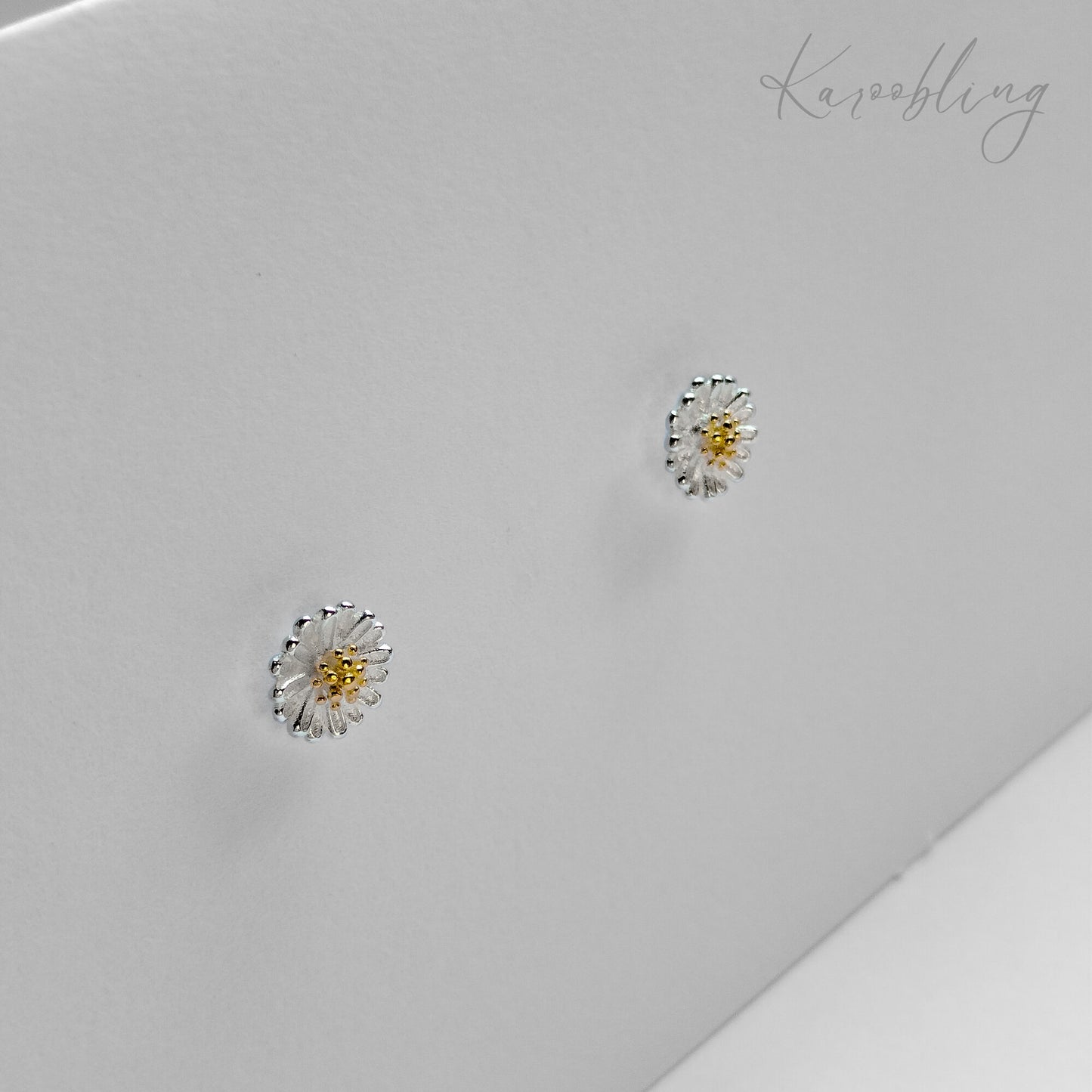 Sterling Silver Two-Tone Daisy Sparkle Earrings - close up