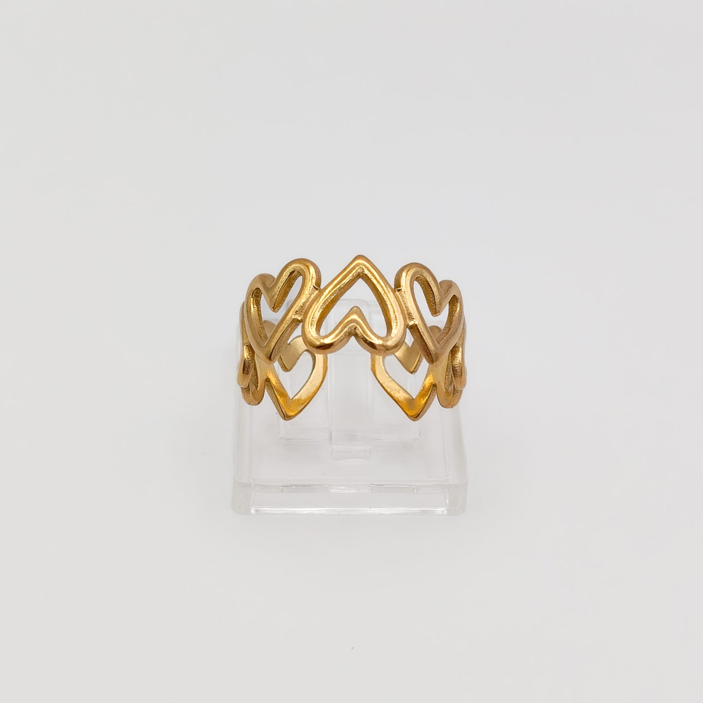 Packshot of an adjustable gold plated heart ring, waterproof and tarnish resistant