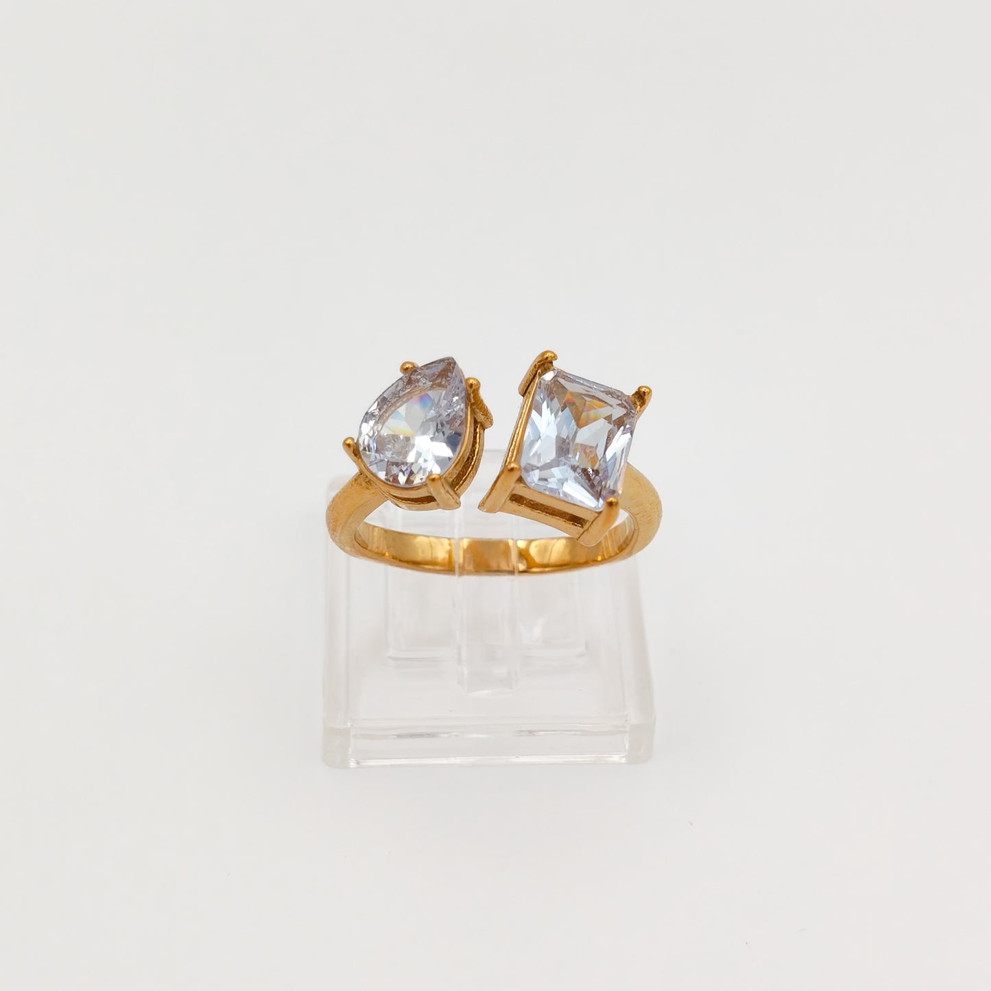 packshot of a gold plated toi et moi cubic zirconia ring, water & tarnish proof