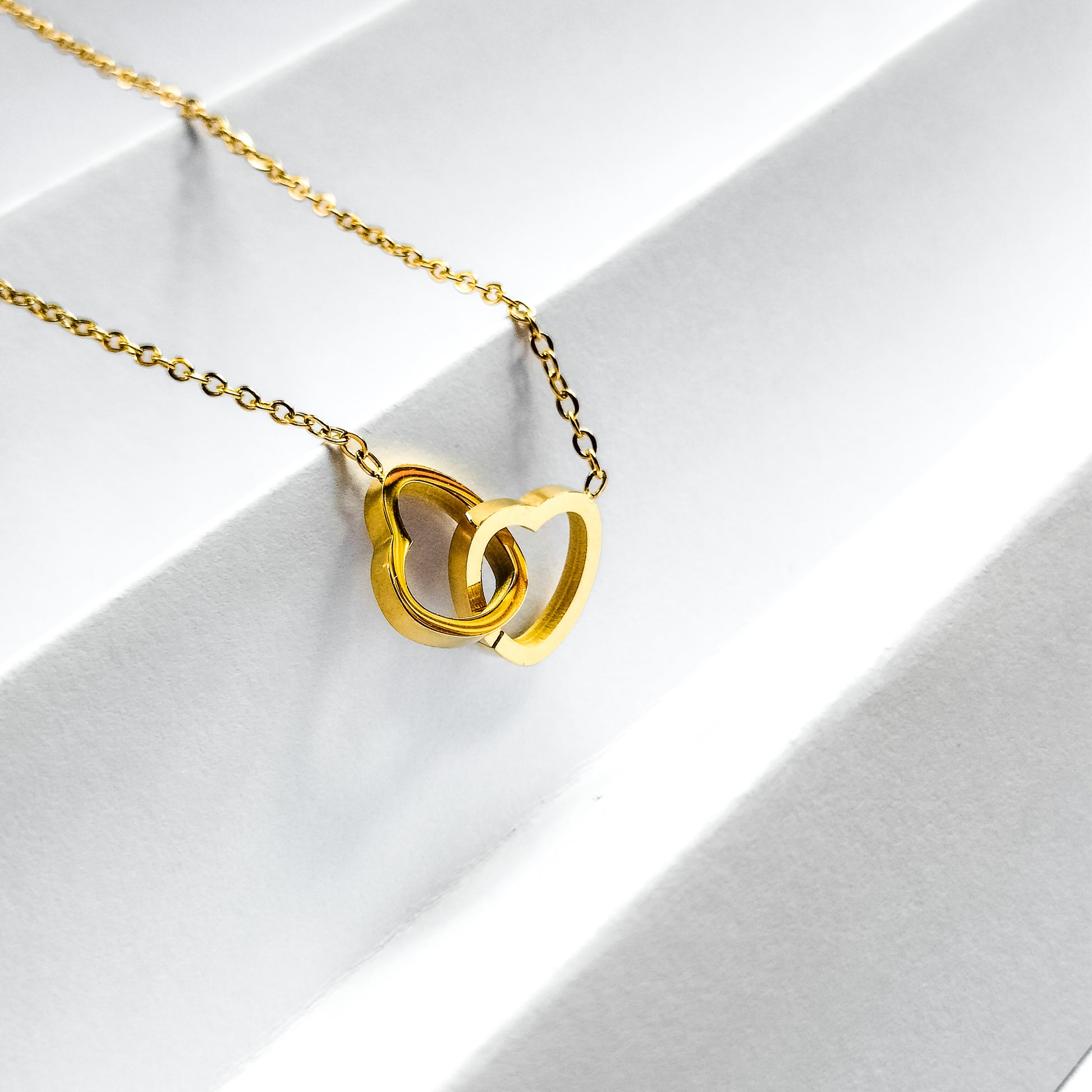18k gold plated linked hearts necklace, water and tarnish proof
