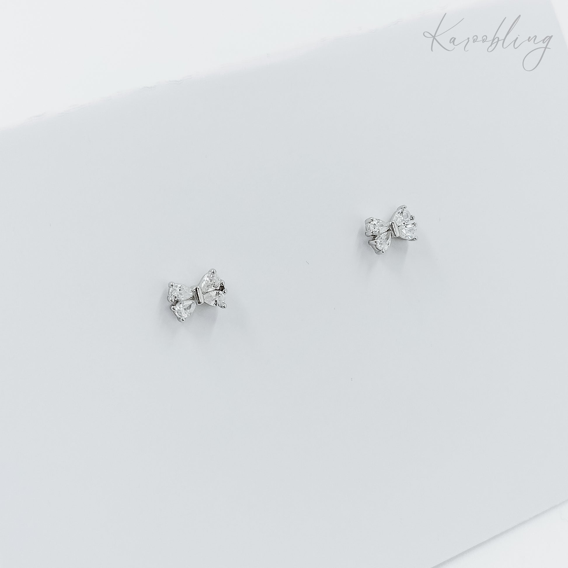 cubic zirconia bow stud earrings sterling silver