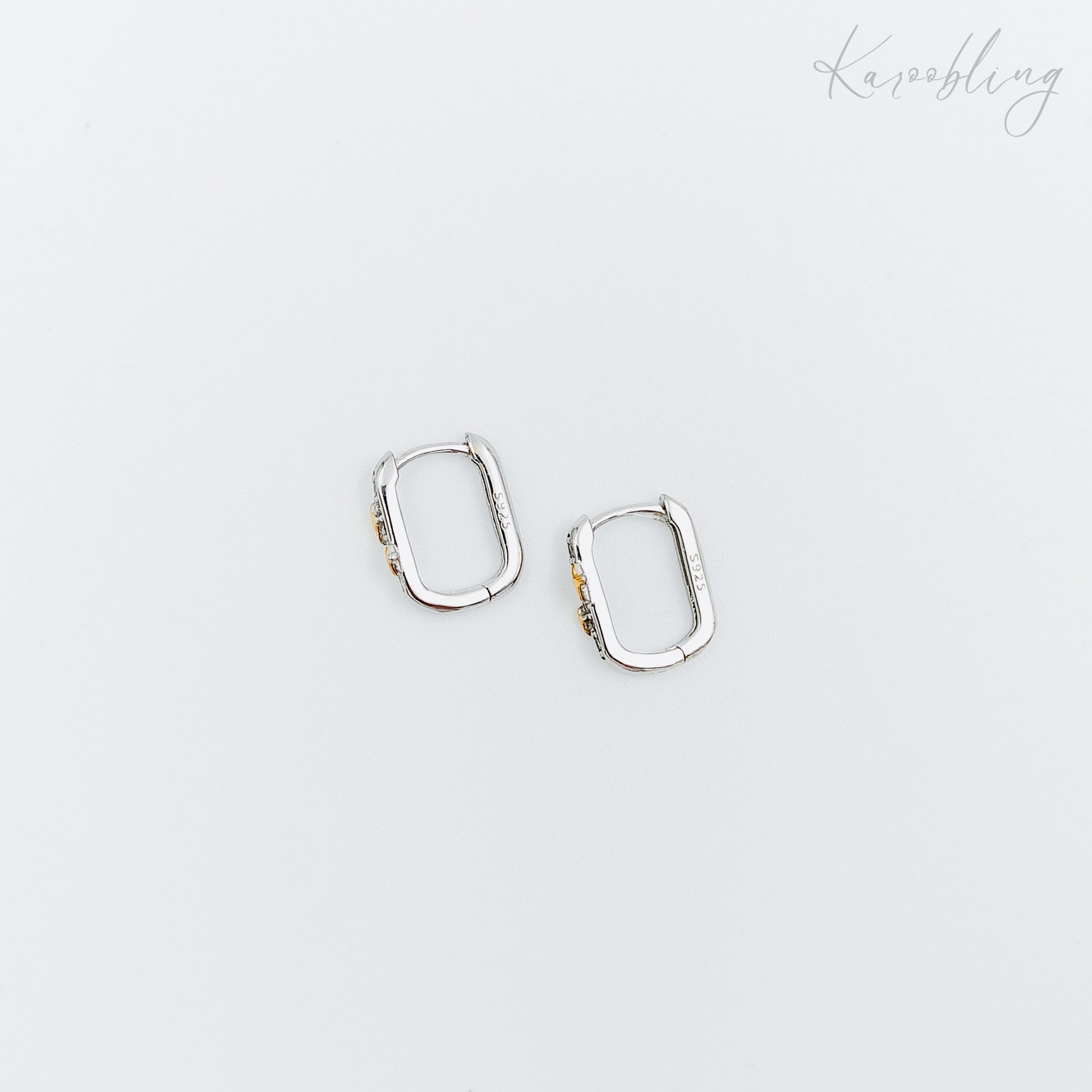 cubic zirconia star huggie earrings sterling silver (hypoallergenic)