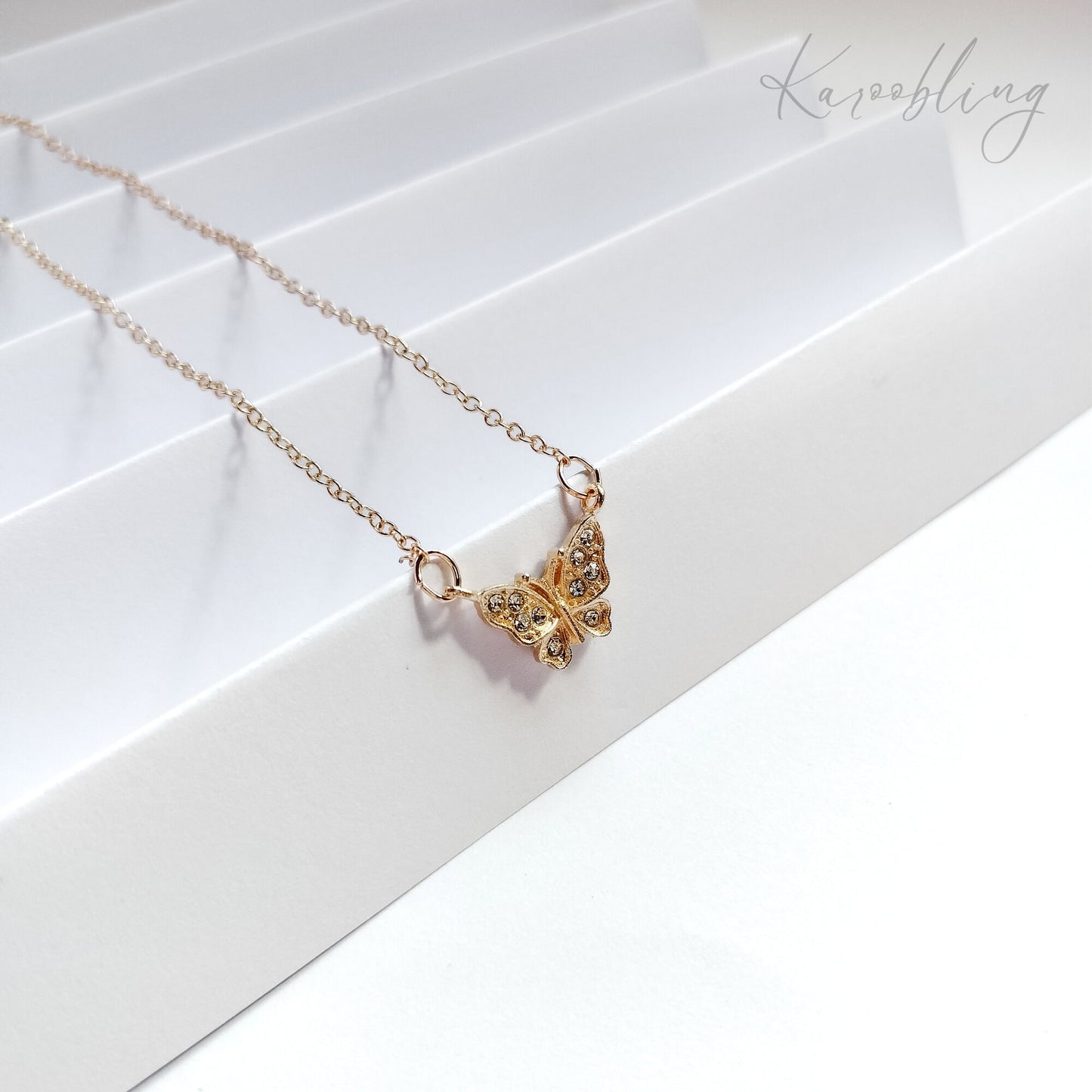 Gold FlutterGlow Butterfly Necklace