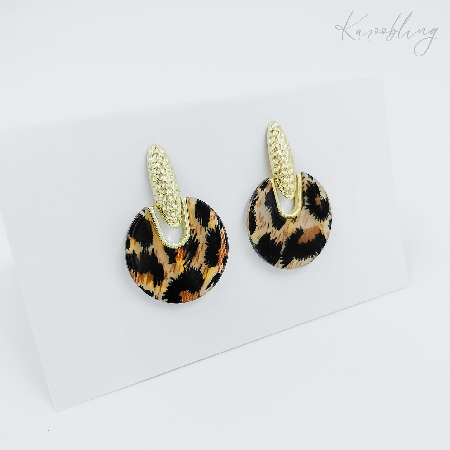 gold plated leopard print statement earrings