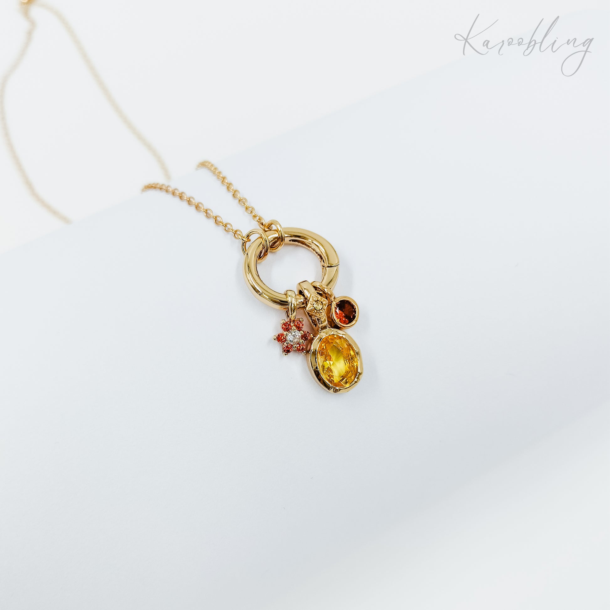 gold plated multi-charm rhinestone necklace, fashion jewellery