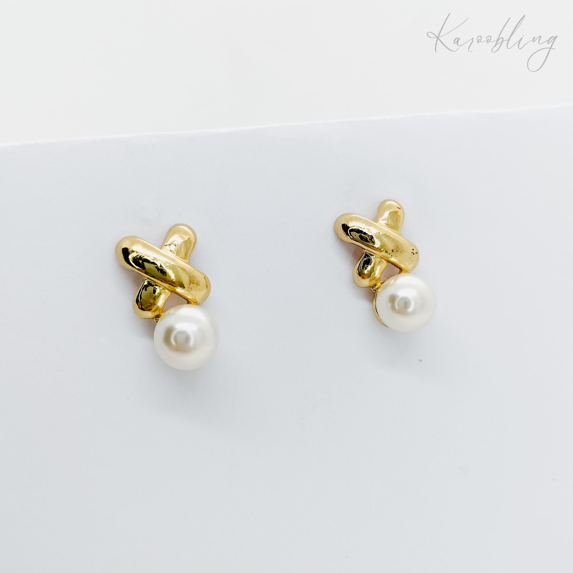 gold plated pearl x stud earrings