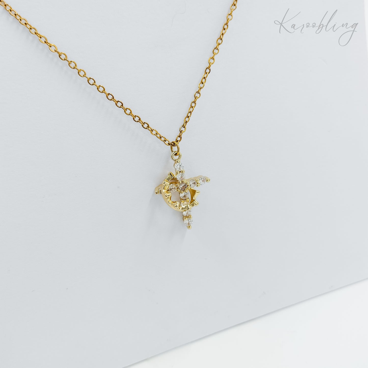gold plated rotating crown cross necklace (fashion jewellery)
