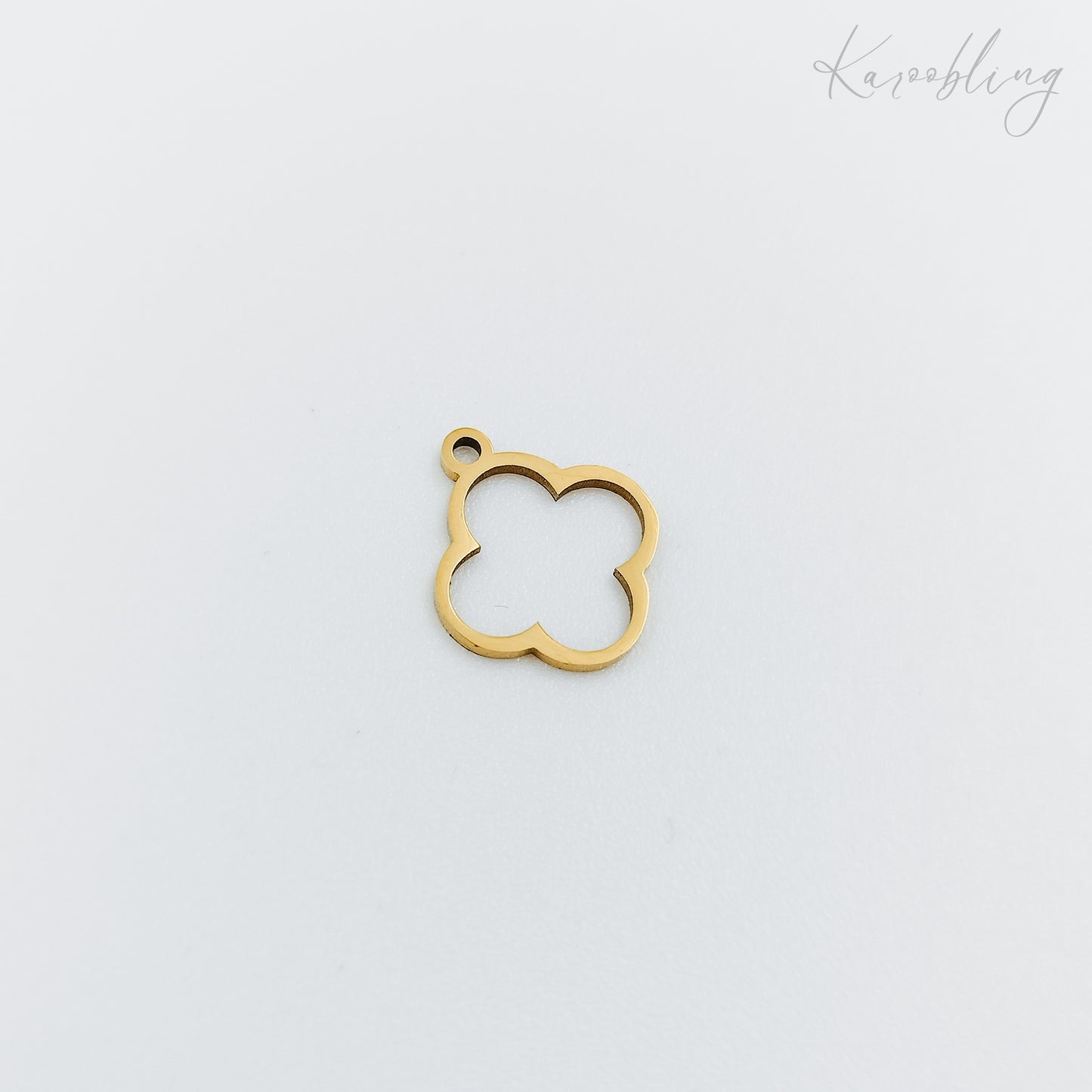 gold plated thin clover outline charm (water & tarnish proof)