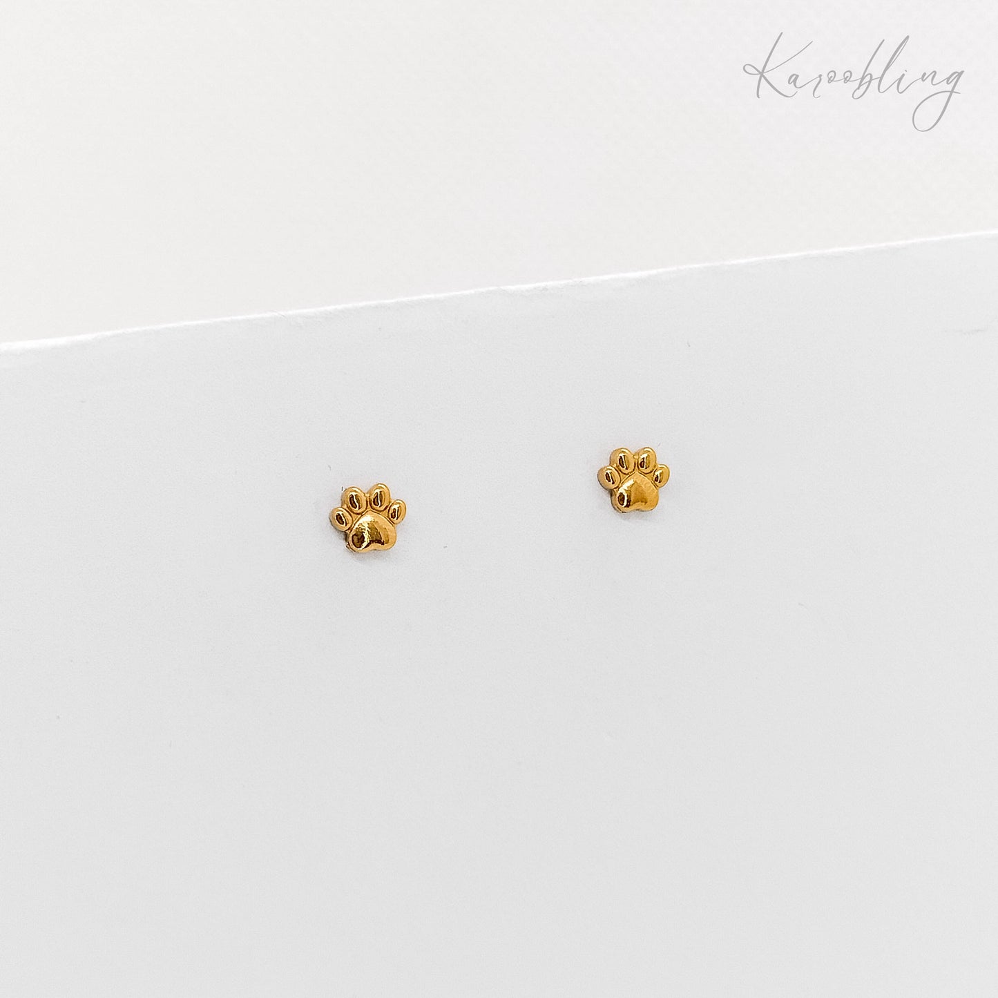 gold tiny paw print stud earrings (water & tarnish proof)