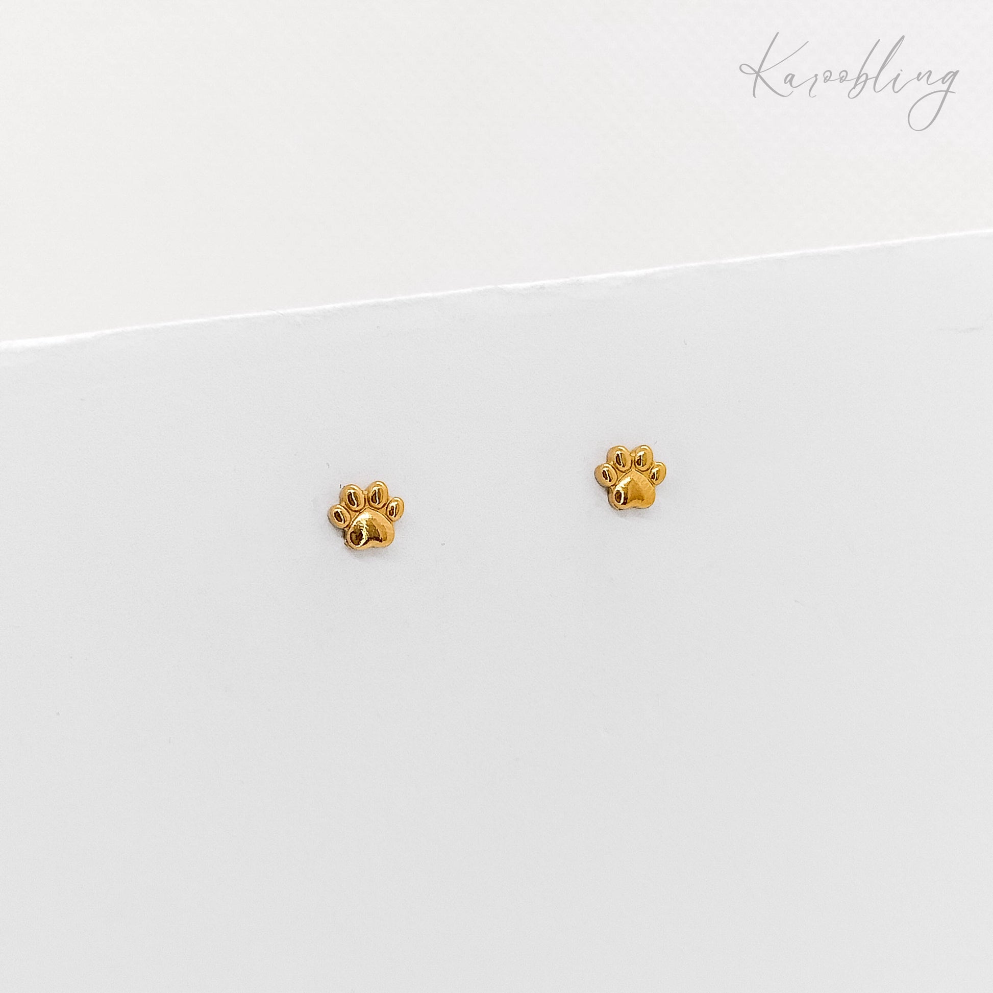 gold tiny paw print stud earrings (water & tarnish proof)