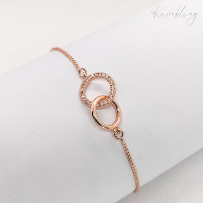 rose gold plated interlocking circle pullcord bracelet 