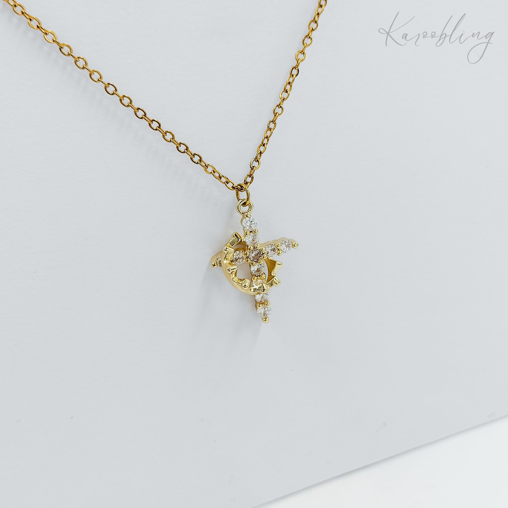 rotating crown cross necklace gold plated (fashion jewellery)