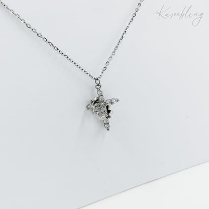 rotating crown cross necklace silver plated (fashion jewellery)