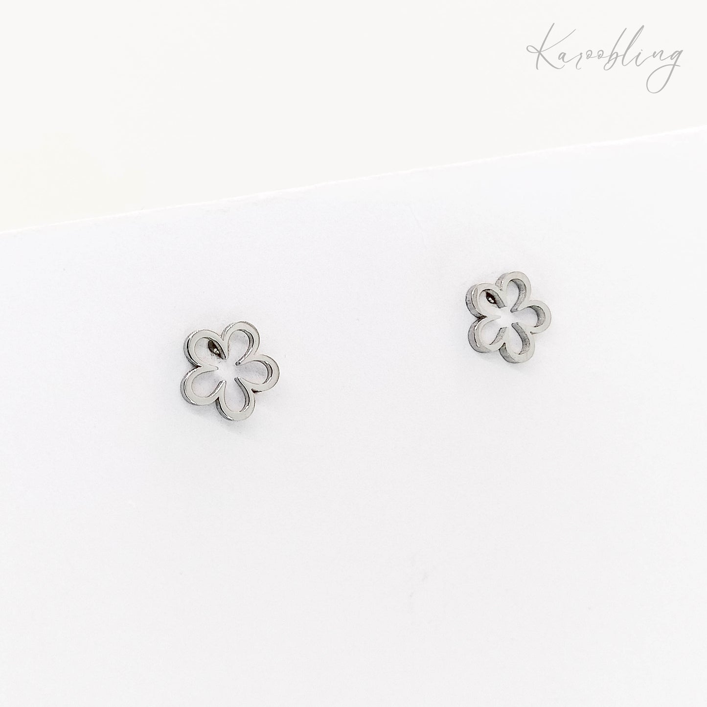 silver-plated hollow flower stud earrings (water & tarnish proof)