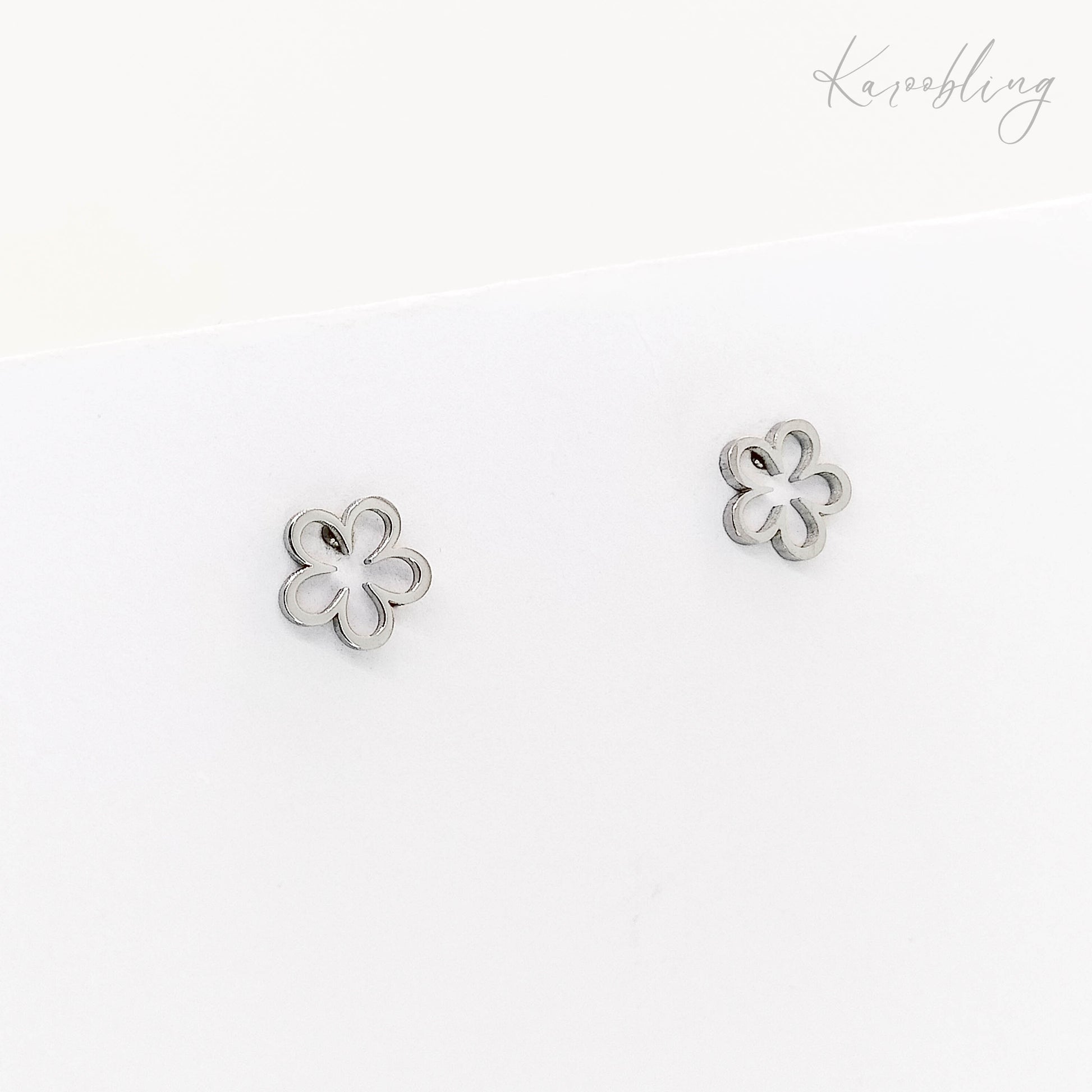 silver-plated hollow flower stud earrings (water & tarnish proof)