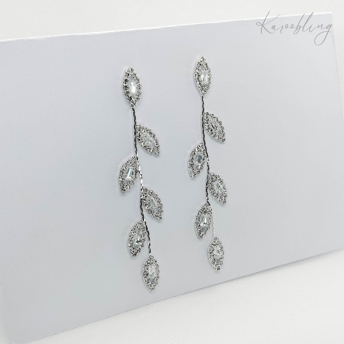 silver leaf statement earrings