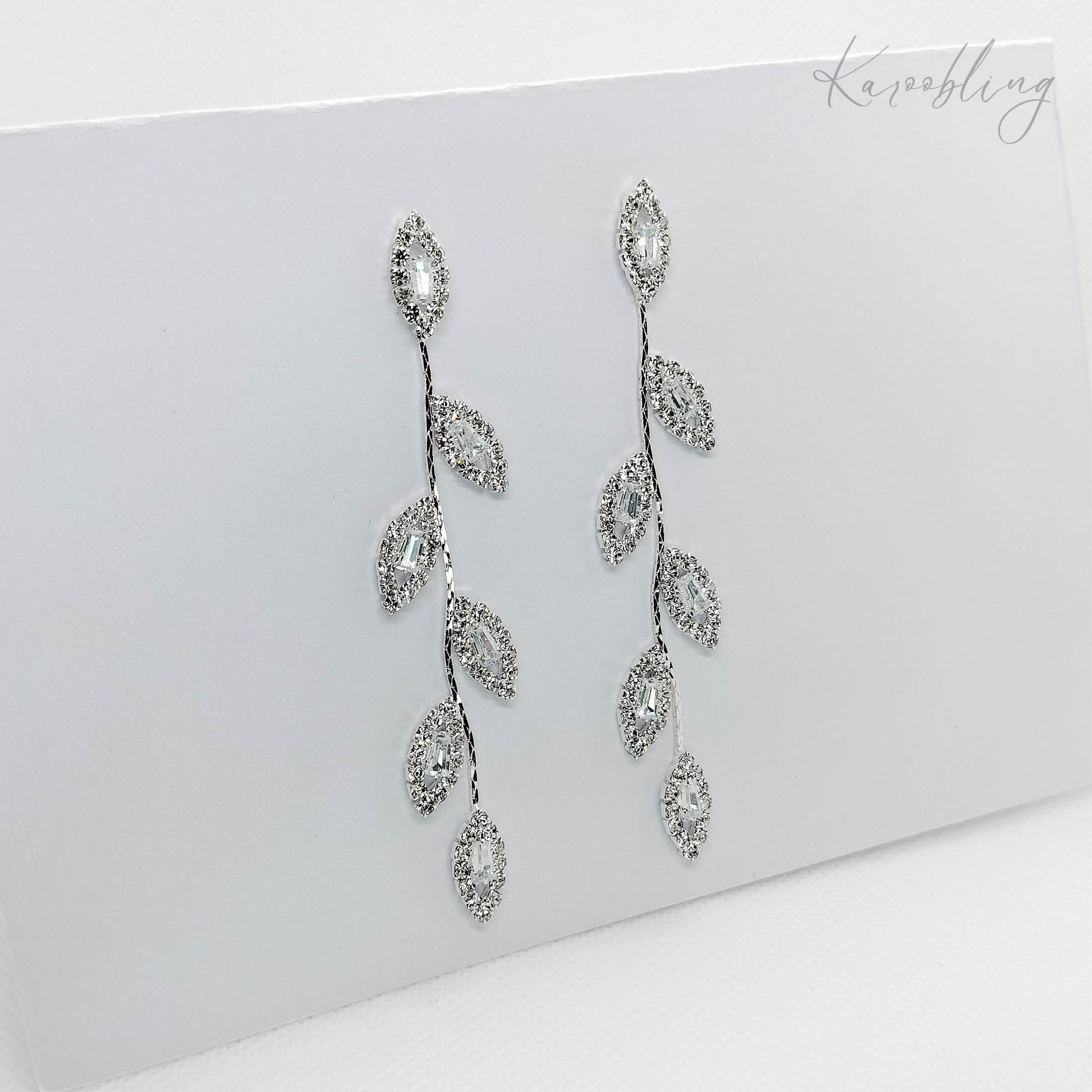 silver leaf statement earrings