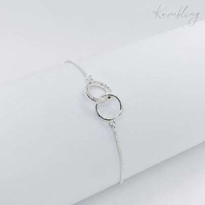 silver plated interlocking circle pullcord bracelet