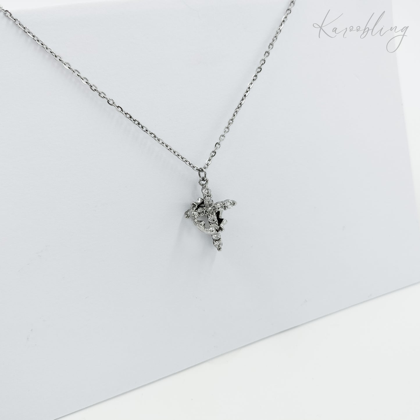 silver plated rotating crown cross necklace (fashion jewellery)