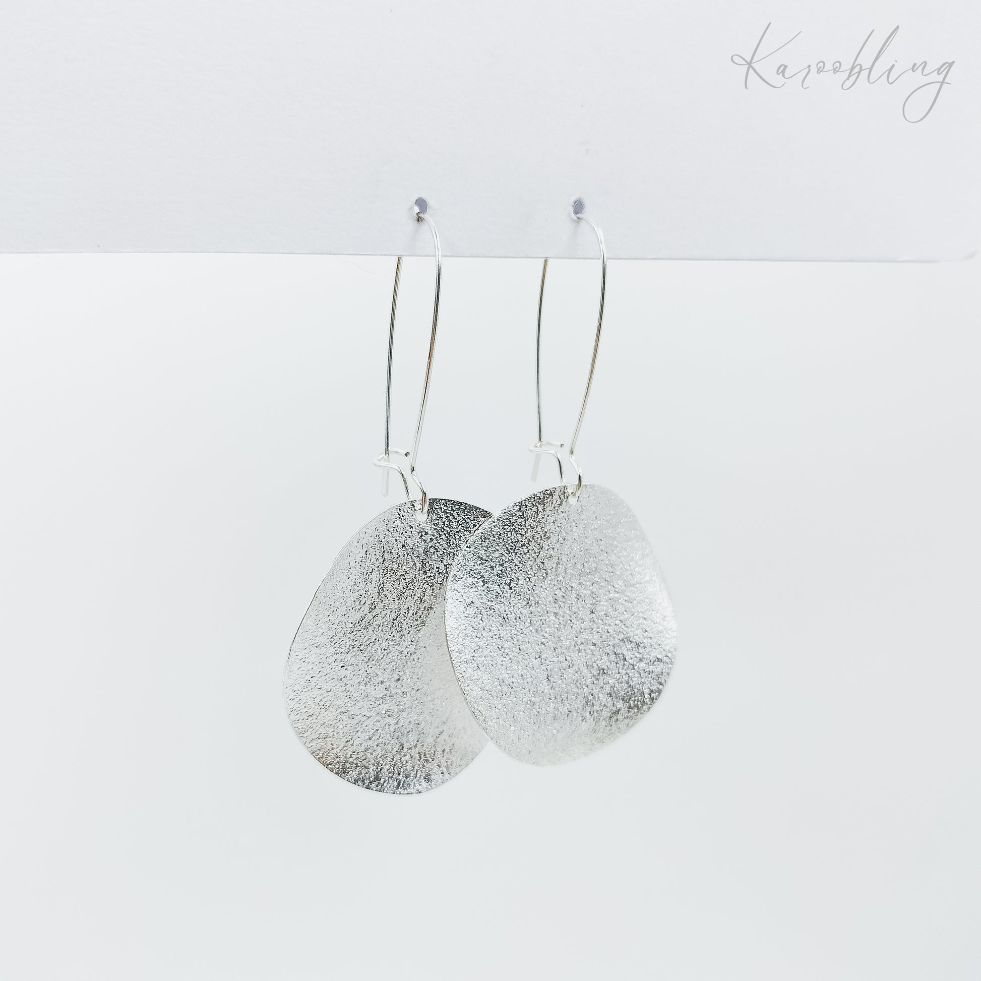 silver plated textured drop earrings