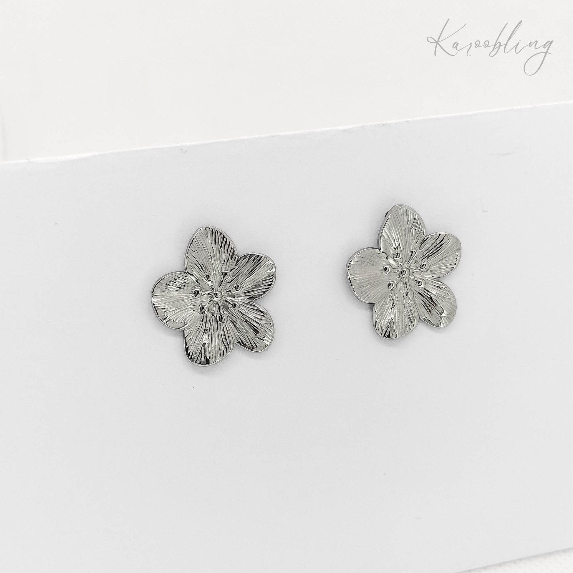 silver textured flower stud earrings (water & tarnish proof)