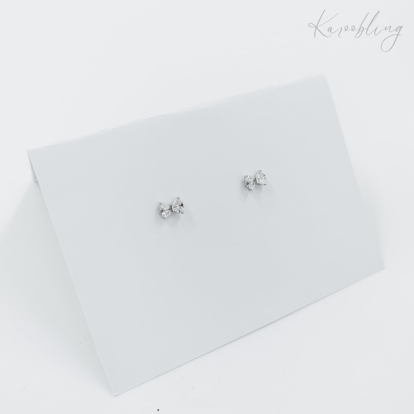 sterling silver cubic zirconia bow stud earrings