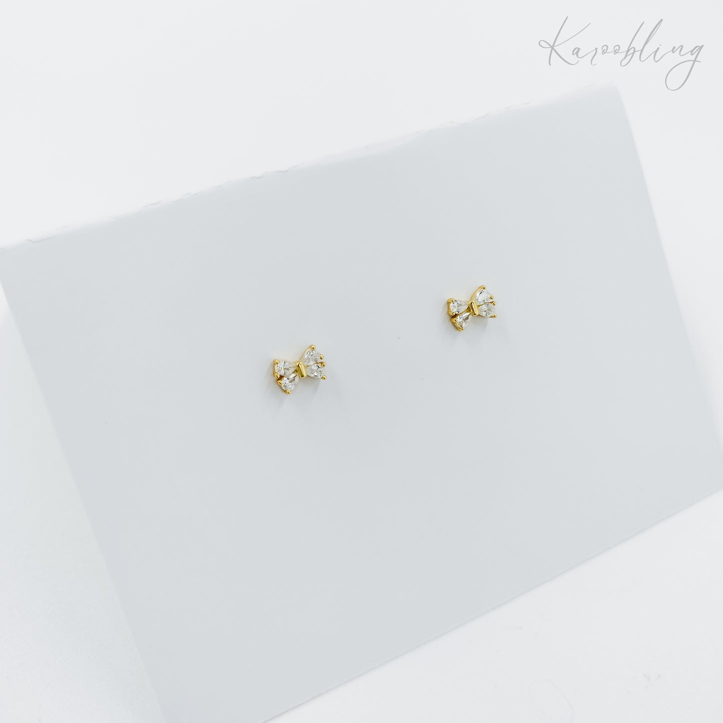 sterling silver cubic zirconia bow stud earrings gold plated