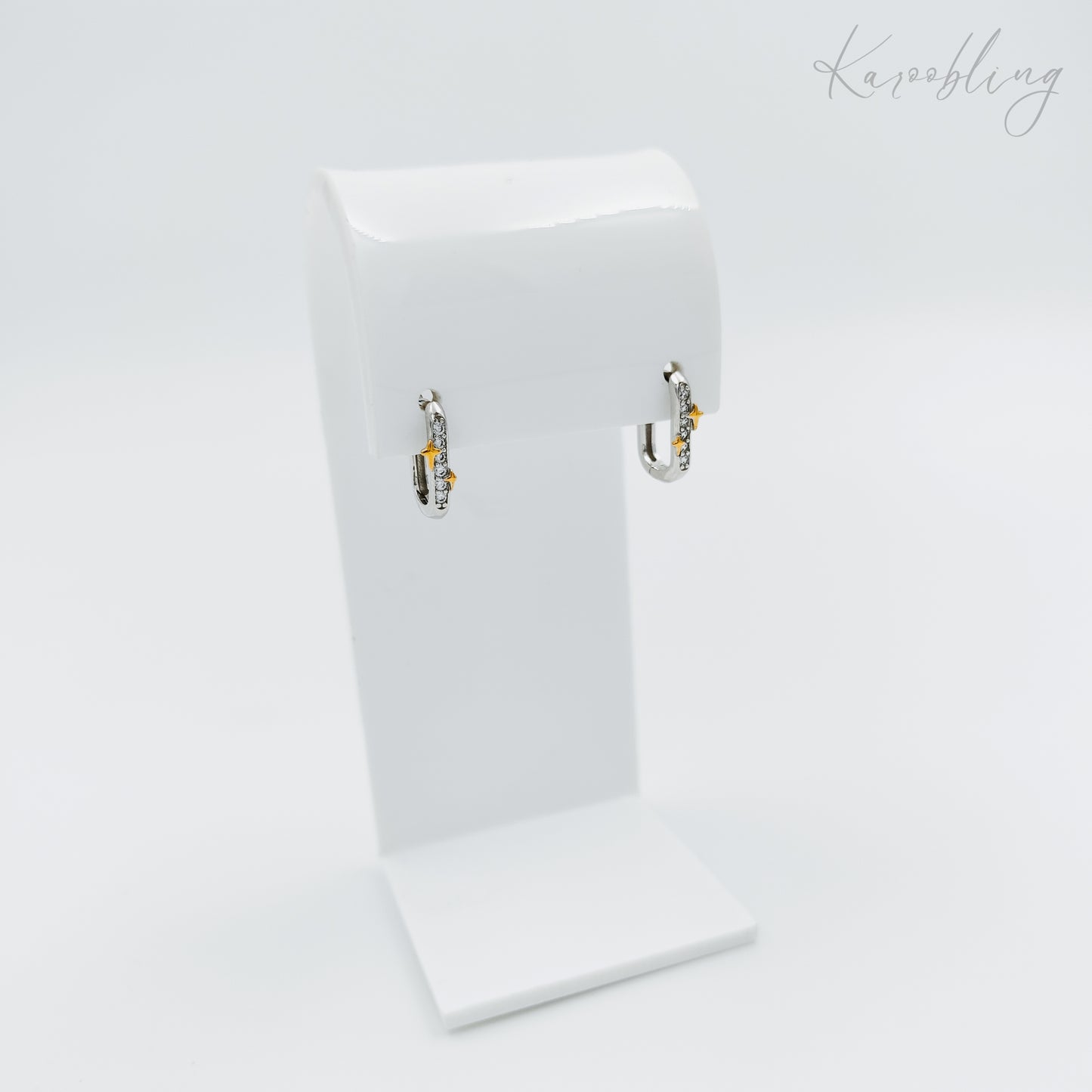 sterling silver cubic zirconia star huggie earrings (hypoallergenic)