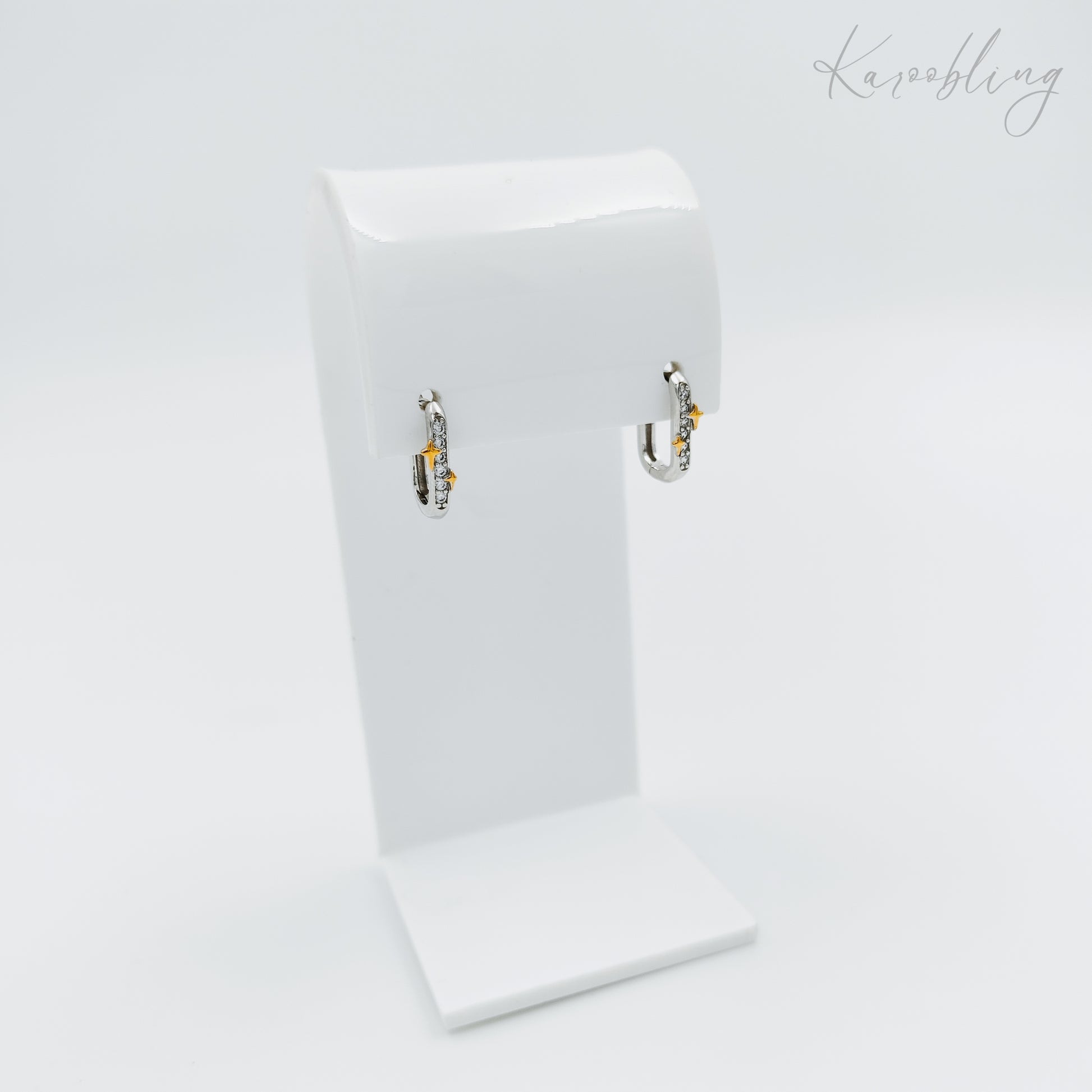 sterling silver cubic zirconia star huggie earrings (hypoallergenic)