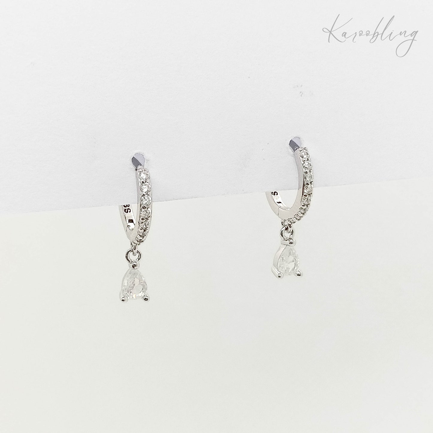 sterling silver teardrop huggie earrings