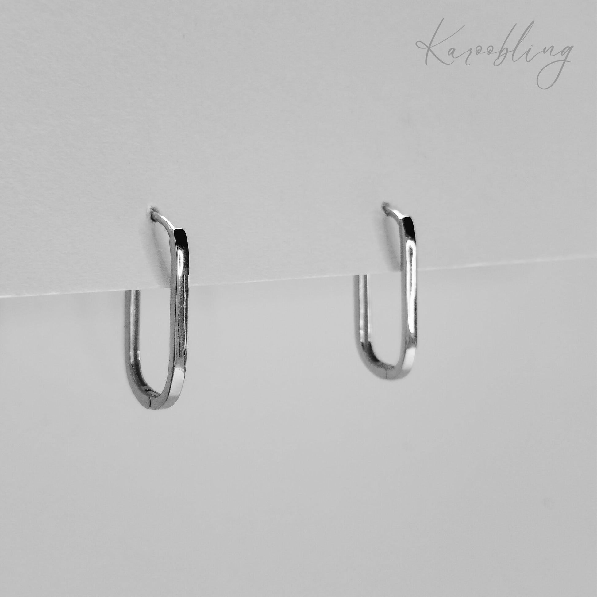 Sterling Silver Serene Ellipse Huggie Hoop Earrings