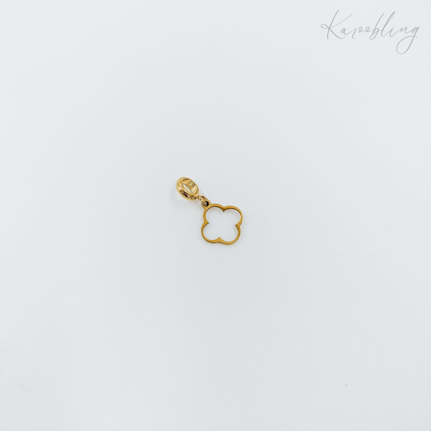 thin clover outline charm gold plated (water & tarnish proof)