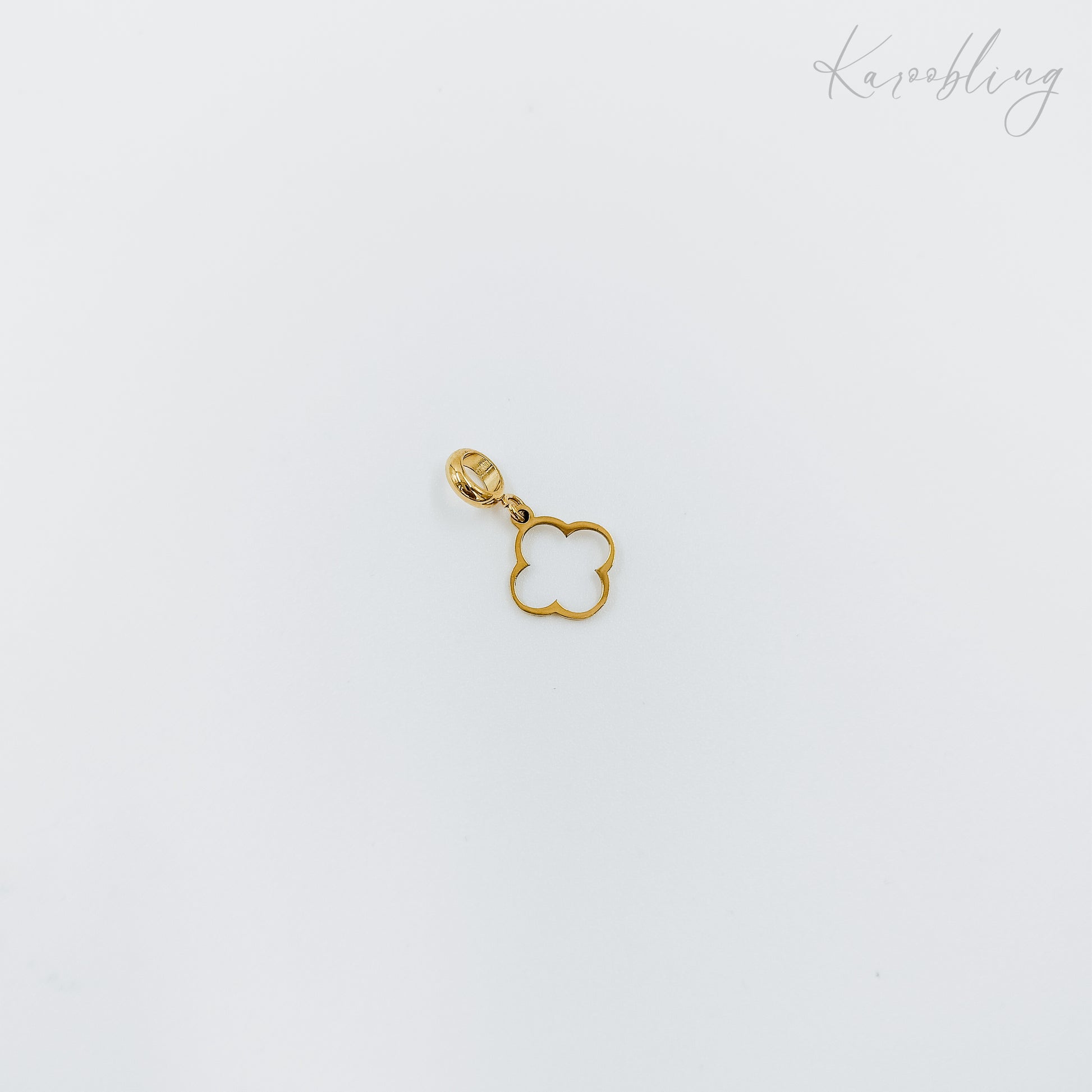 thin clover outline charm gold plated (water & tarnish proof)