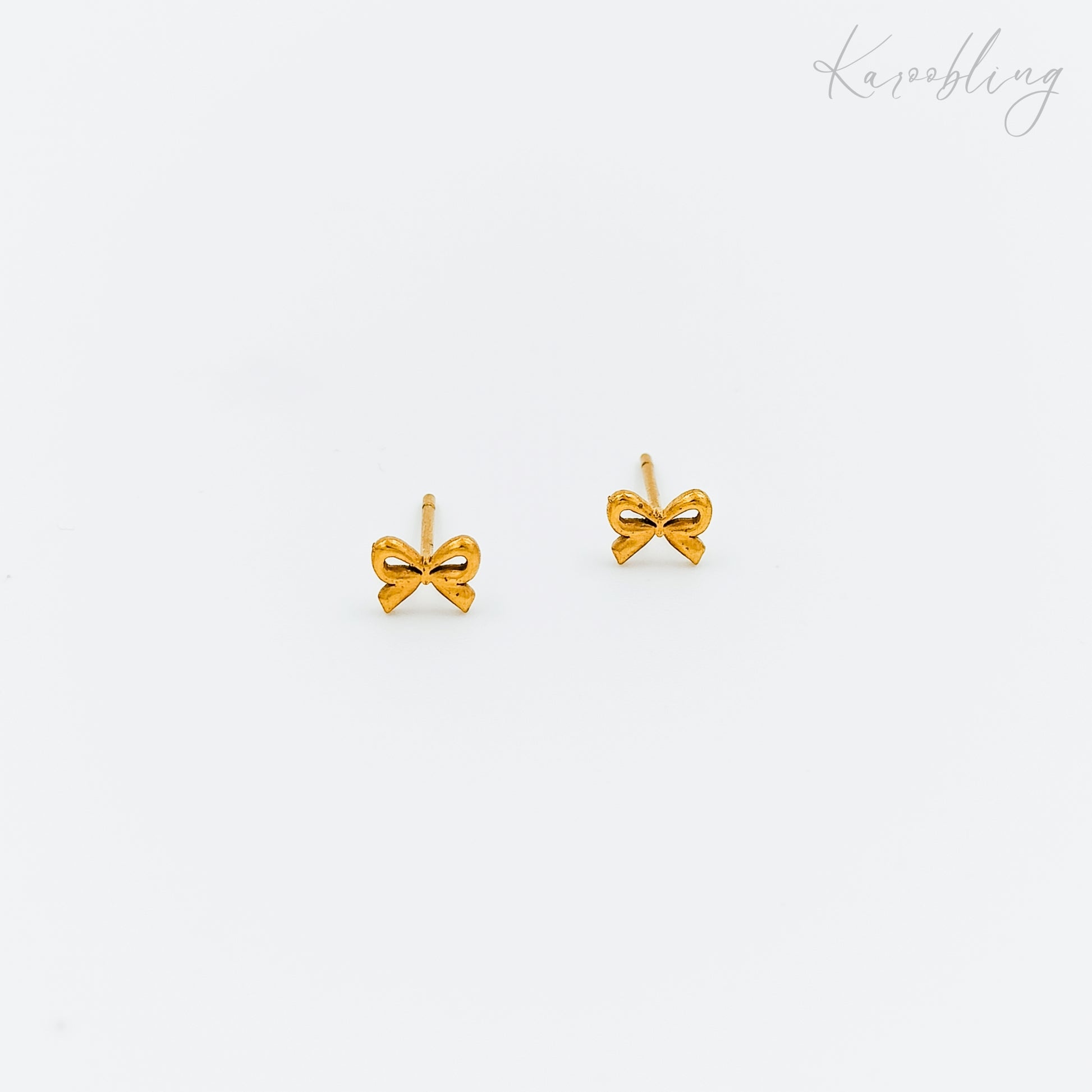 tiny gold plated bow stud earrings (water & tarnish proof)