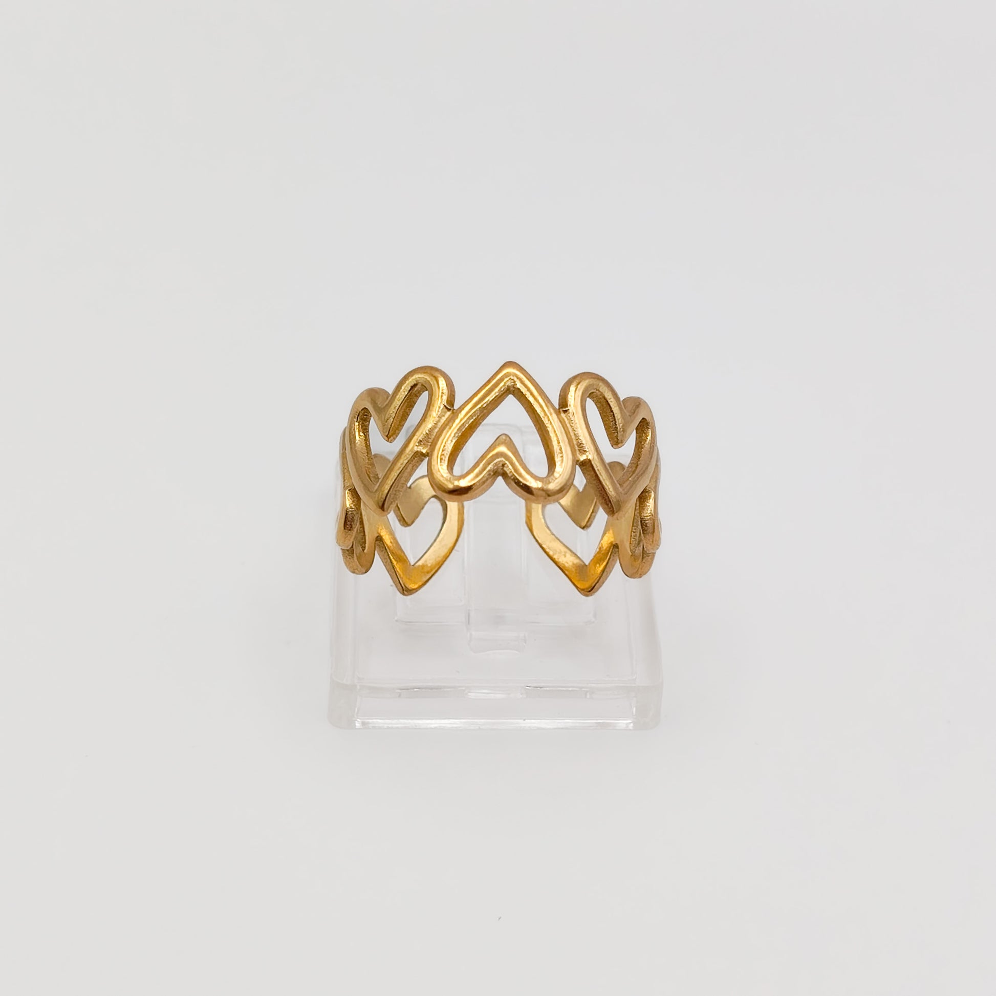 Packshot of an adjustable gold plated heart ring, waterproof and tarnish resistant