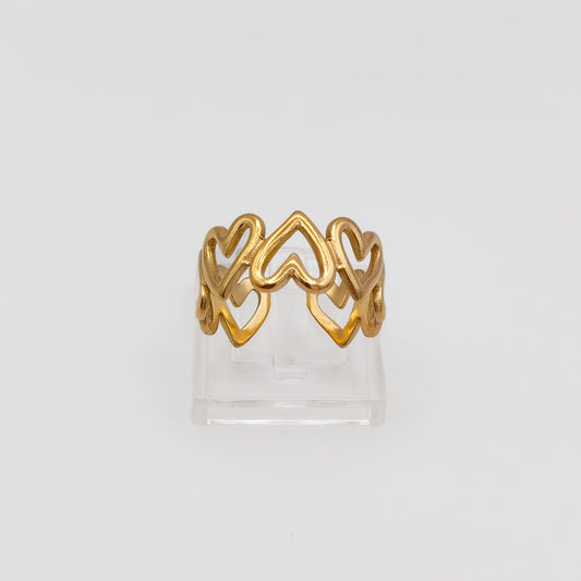 Packshot of an adjustable gold plated heart ring, waterproof and tarnish resistant