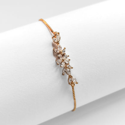 packshot of a gold plated cubic zirconia floral fashion jewellery bracelet