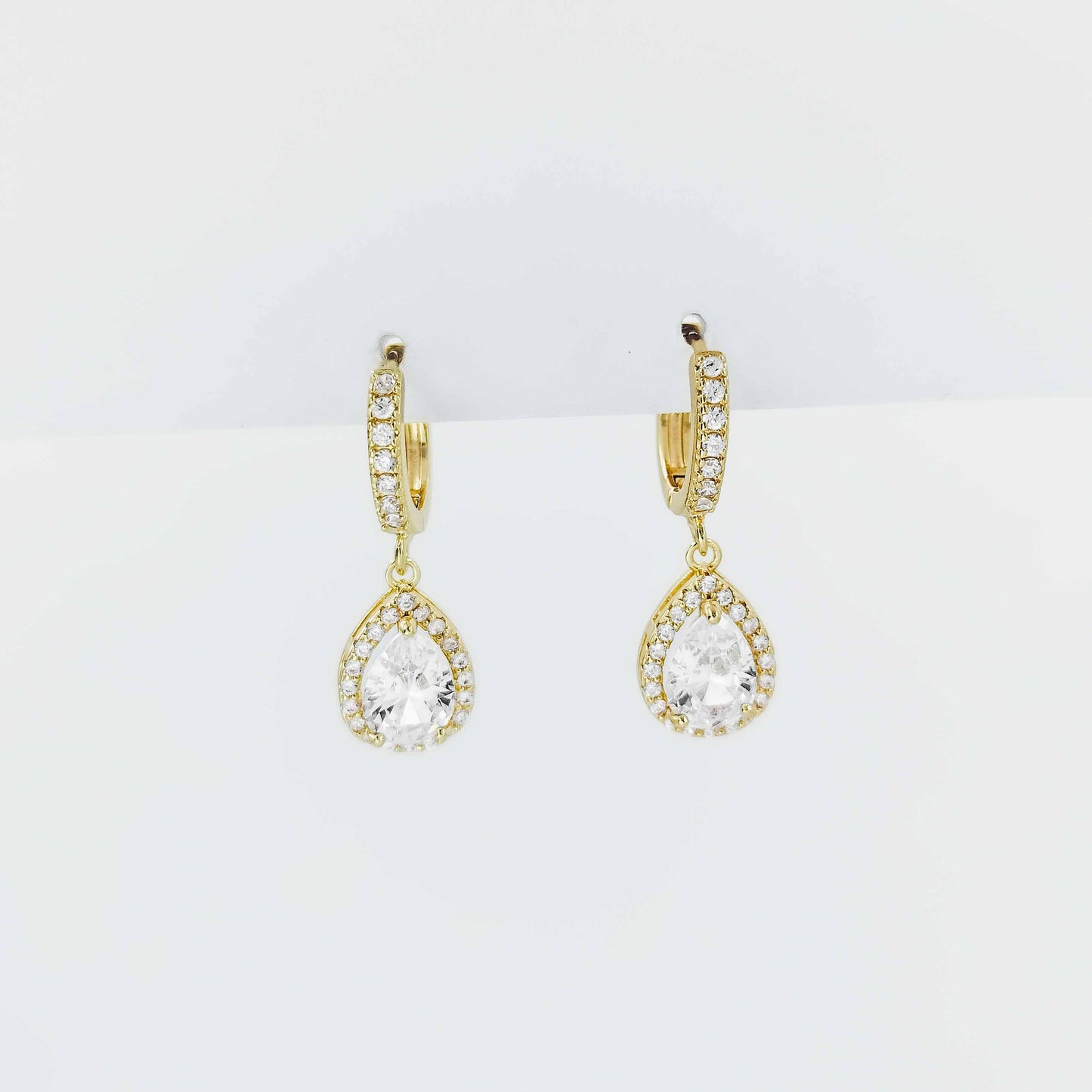 gold plated teardrop huggie earrings from fashion jewellery collection