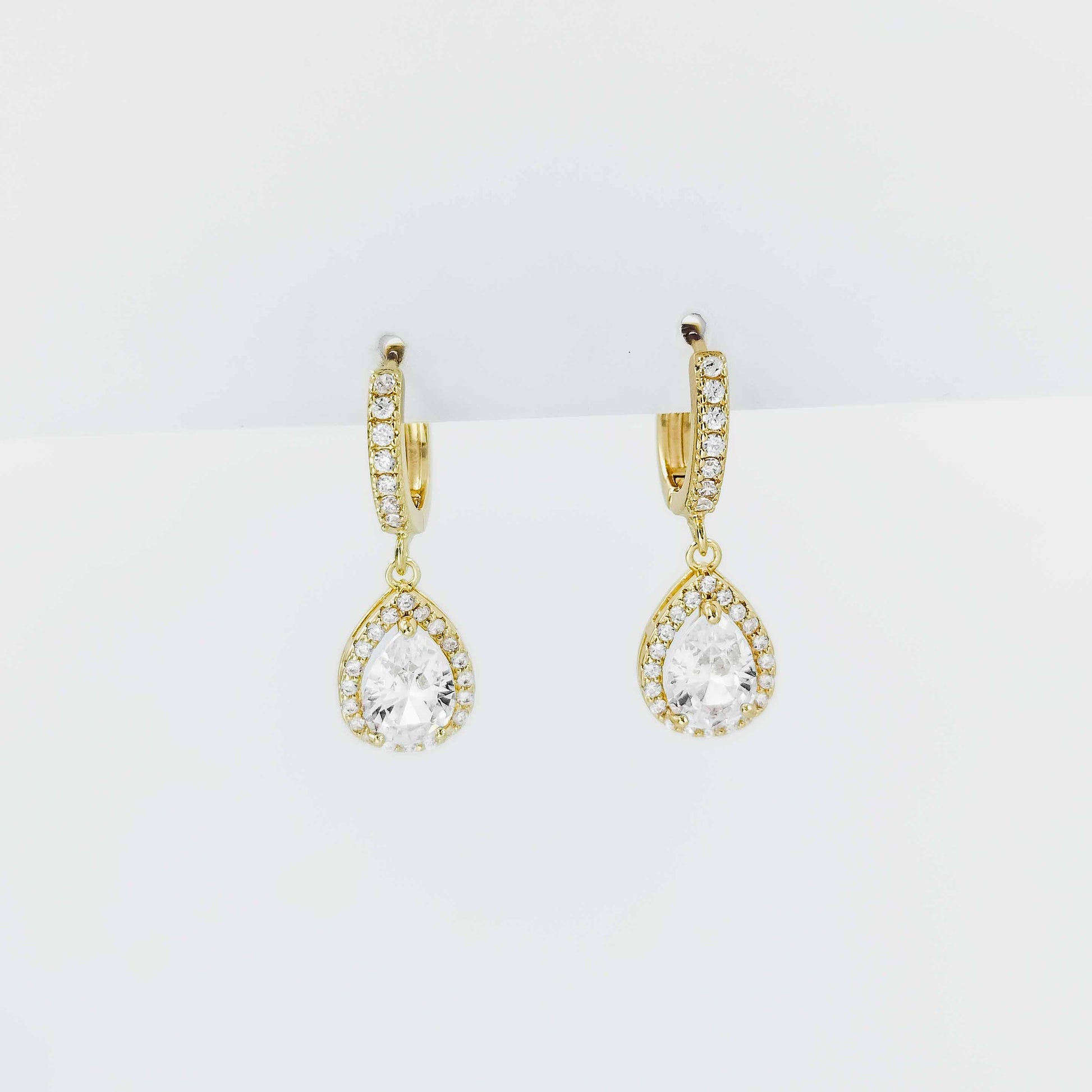gold plated teardrop huggie earrings from fashion jewellery collection