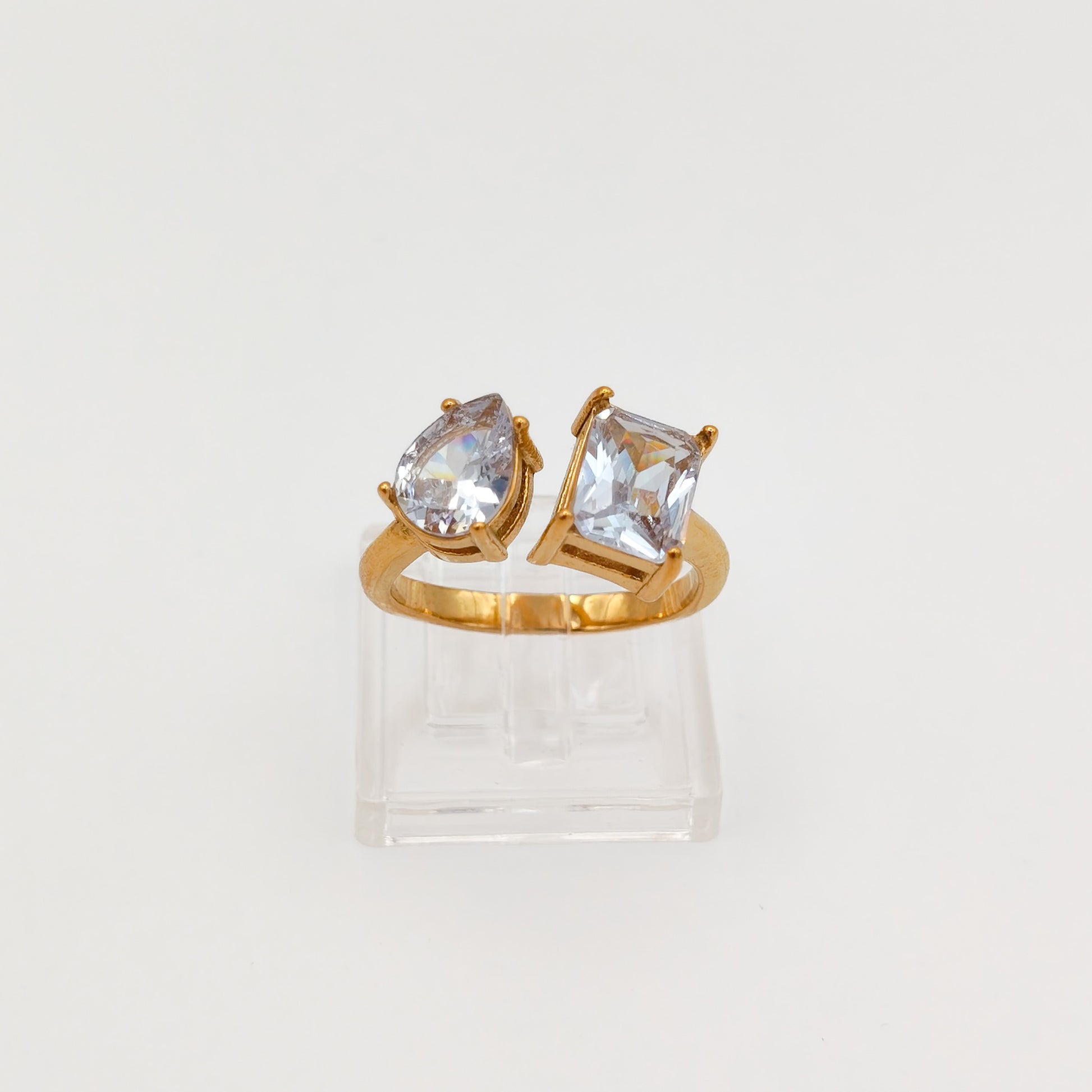 packshot of a gold plated toi et moi cubic zirconia ring, water & tarnish proof