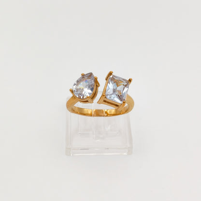 packshot of a gold plated toi et moi cubic zirconia ring, water & tarnish proof
