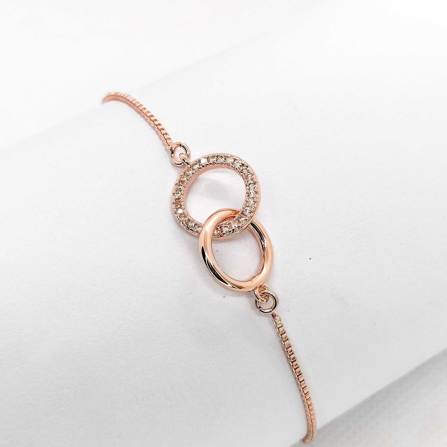 rose gold plated interlocking circle pullcord bracelet, fashion jewellery