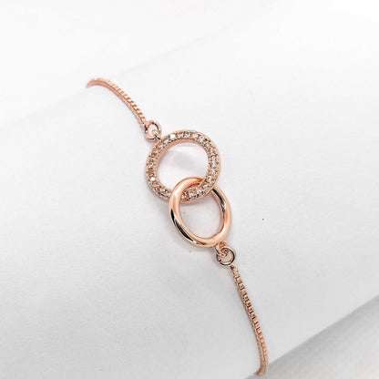 rose gold plated interlocking circle pullcord bracelet, fashion jewellery