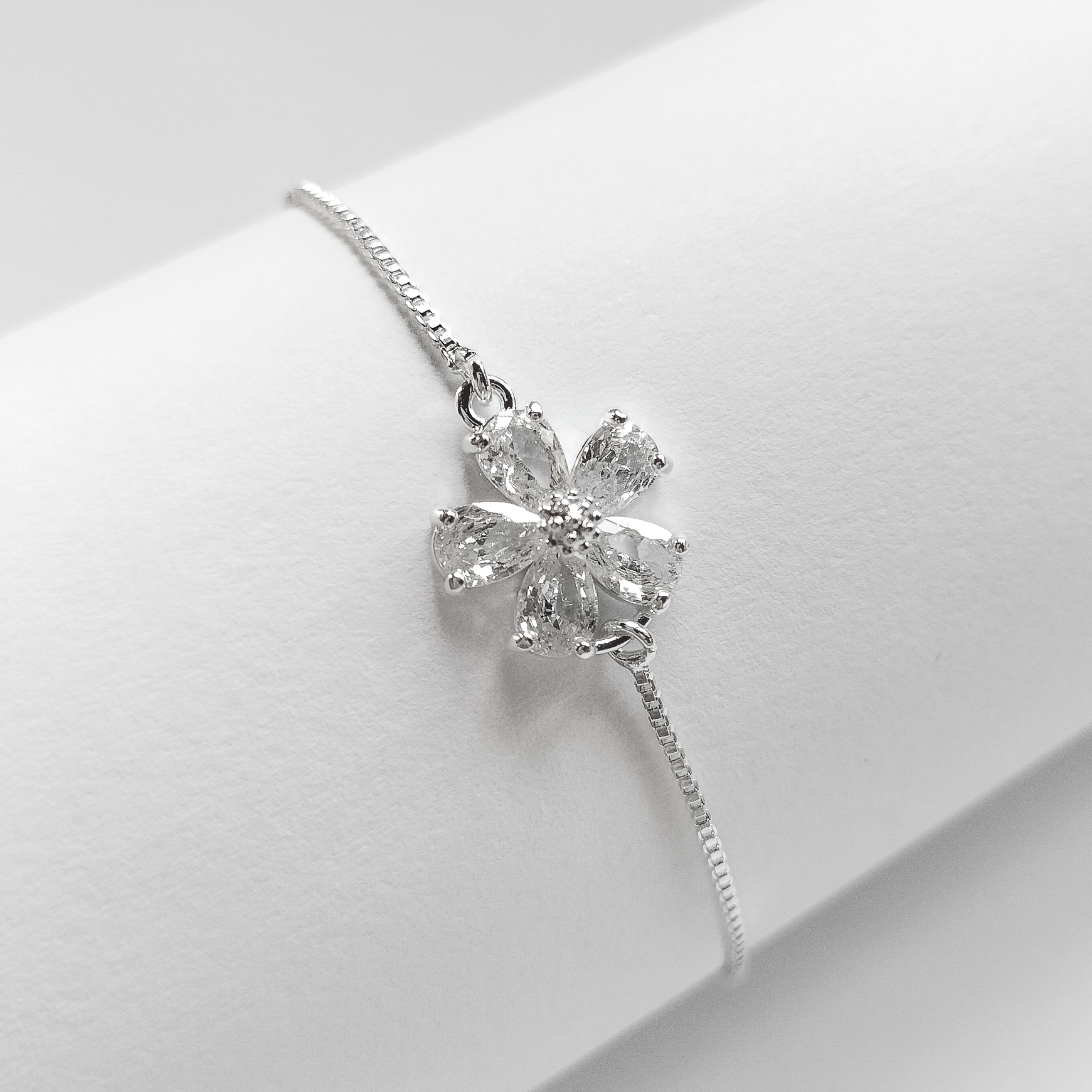 silver plated cubic zirconia flower pullcord bracelet, fashion jewellery 