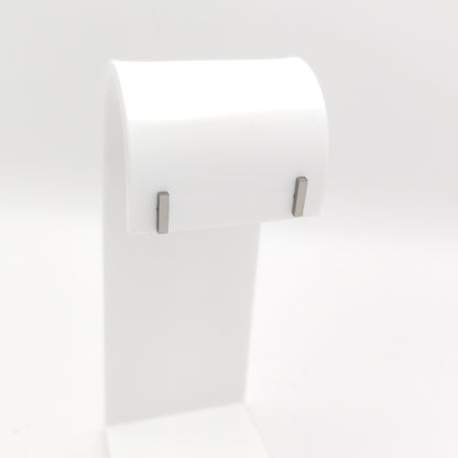 A pair of silver-plated stainless steel minimalist vertical bar stud earrings with a sleek geometric profile, displayed on a white stand.