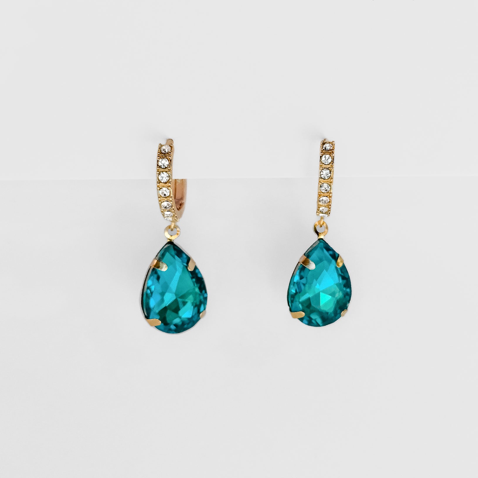 teal blue teardrop huggie earrings from fashion jewelry collection